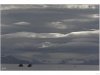 Kayakers travel in summer time in Sptizbergen to visit the hundred of glacier.