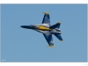 Blue Angel with vapor forming around the plane.